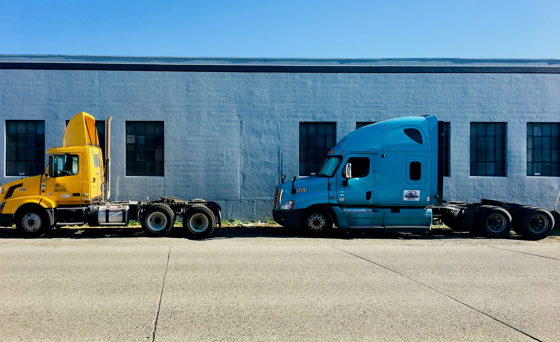Flatbed truck and industrial route context staged for STZINC commercial buyer confidence.