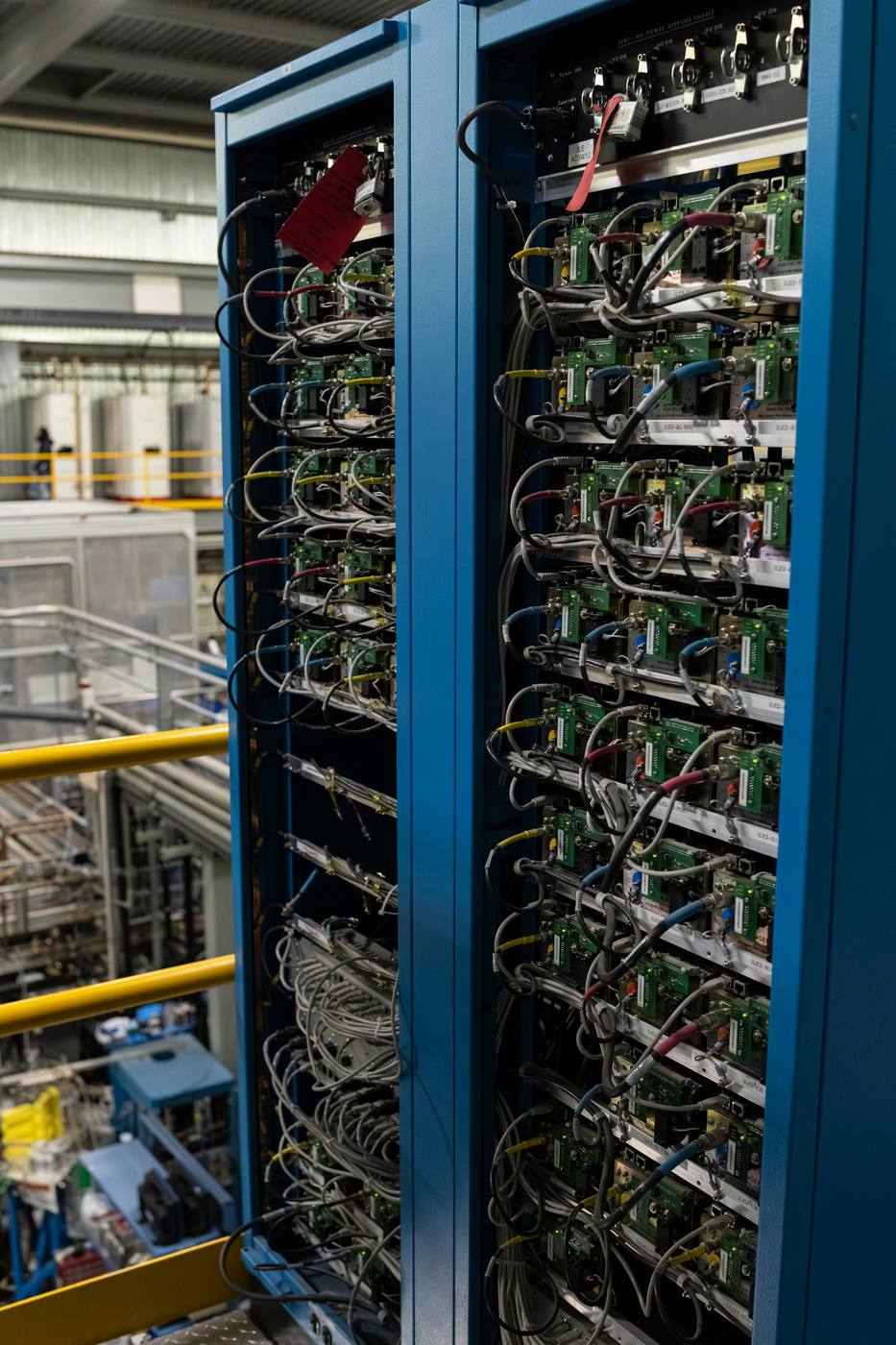 Server rack and network cabling representing protected customer data handling.