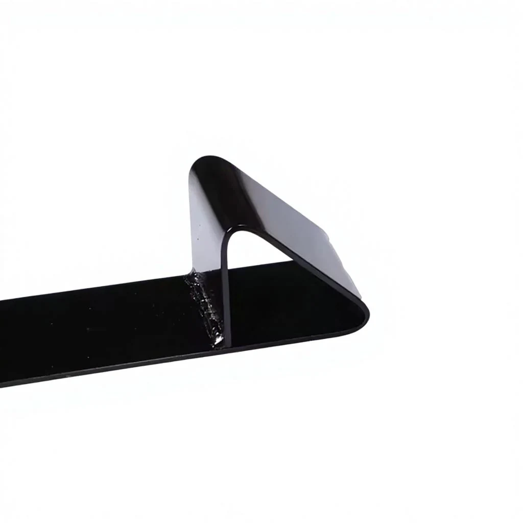 Black metal corner protector side profile showing strap channel depth and edge guard shape