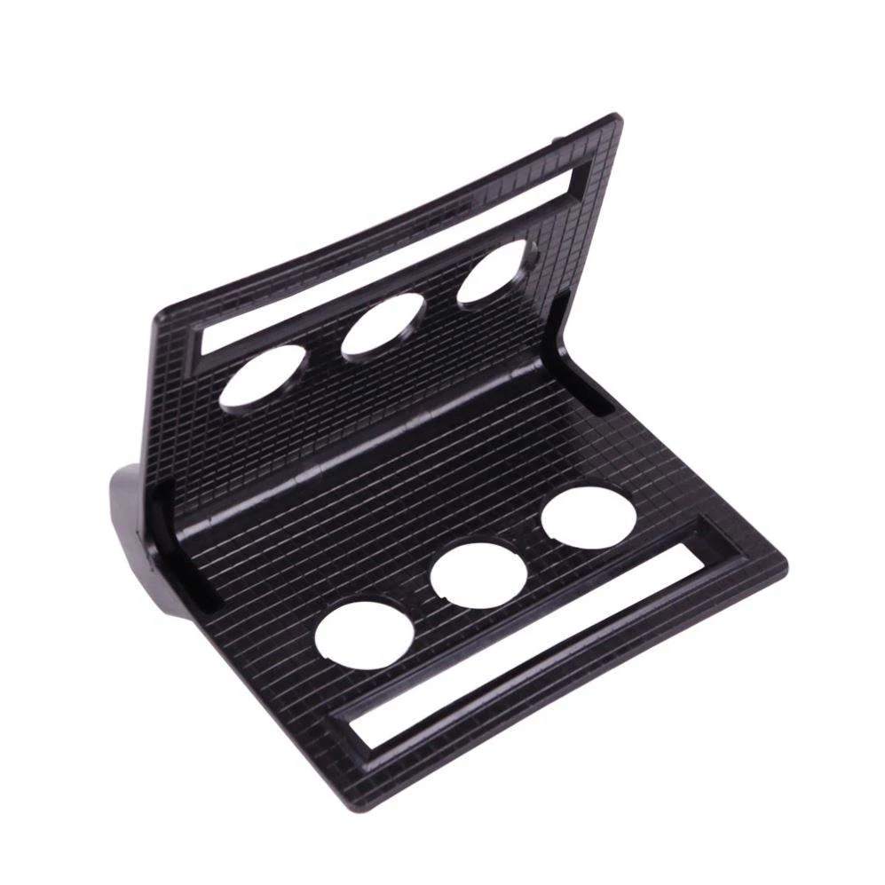 Black 4 inch slotted plastic corner protector with strap holes shown from an angled product view