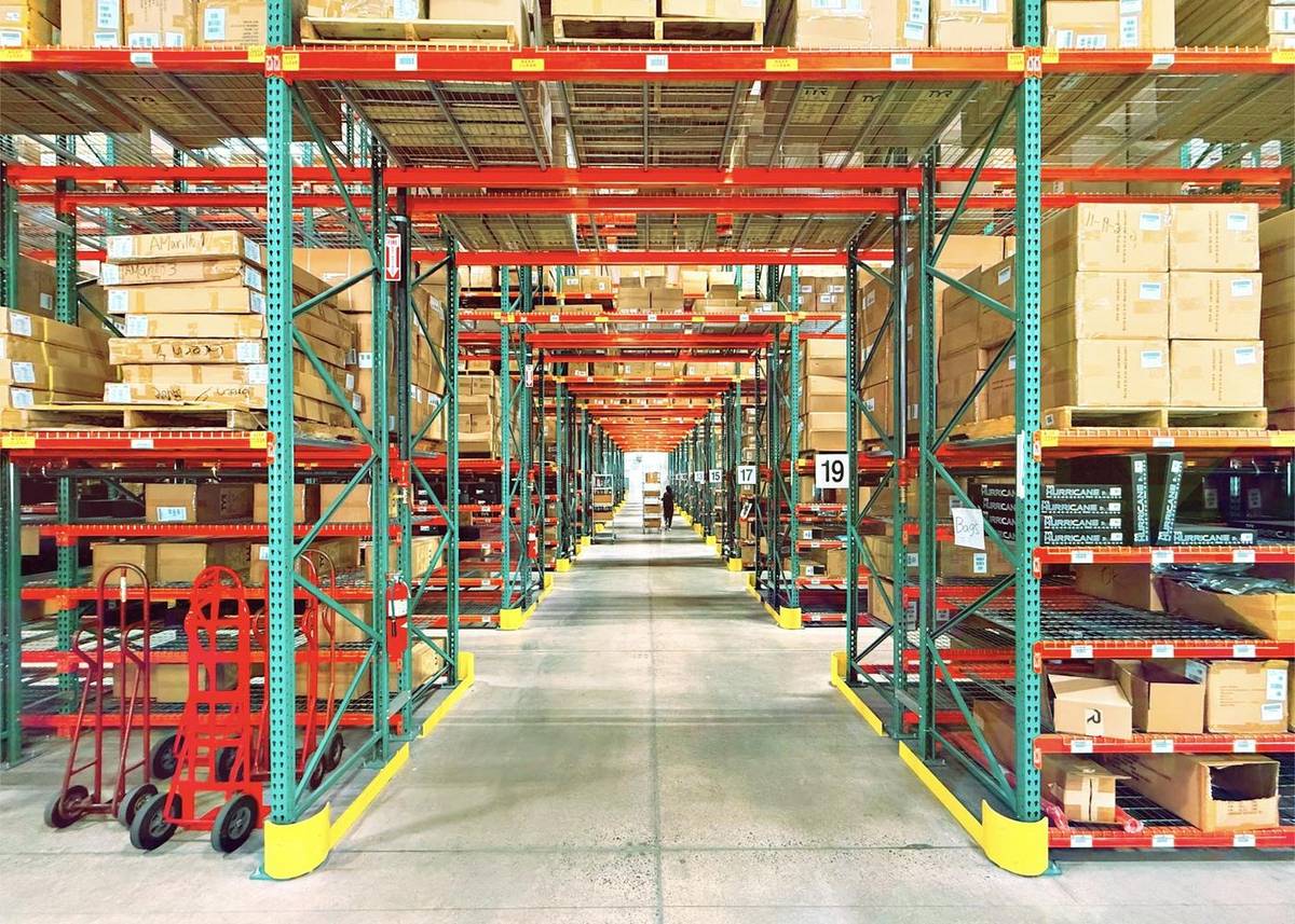 Organized warehouse aisle representing fast STZINC support and FAQ routing.